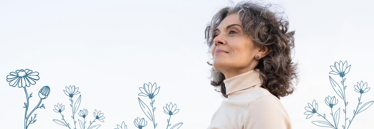 Woman with curly silver hair breathing deeply outdoors – herbal supplements for respiratory health.